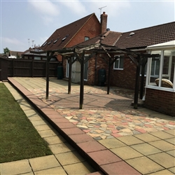 Patio area with coloured slabs after cleaning, Bixley Farm, Ipswich, Suffolk